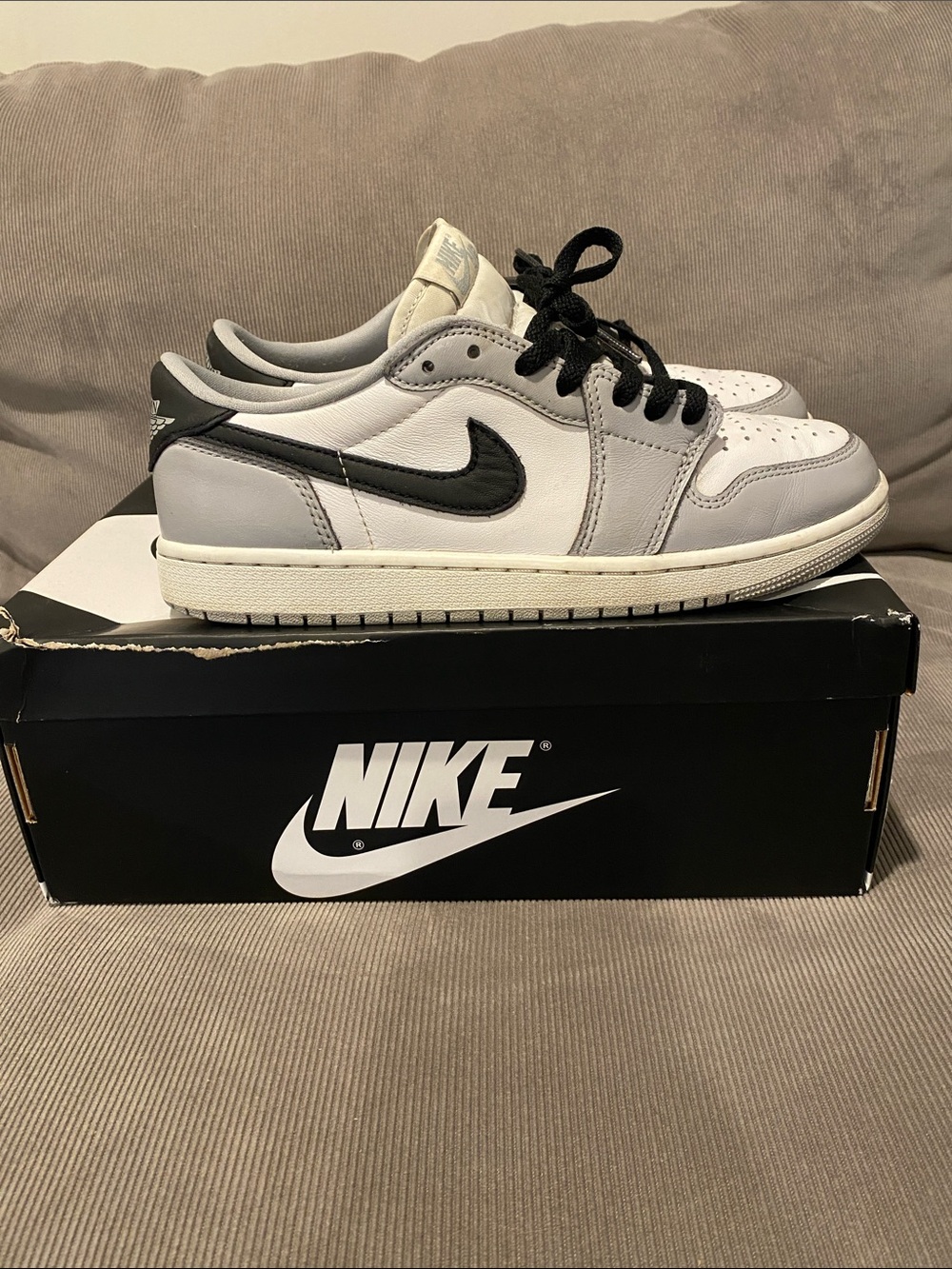 Nike Air Jordan 1 Retro Low OG in White, wolf Gray, and Black